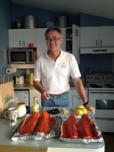 Peter Kearney preparing salmon for volunteers' dinner